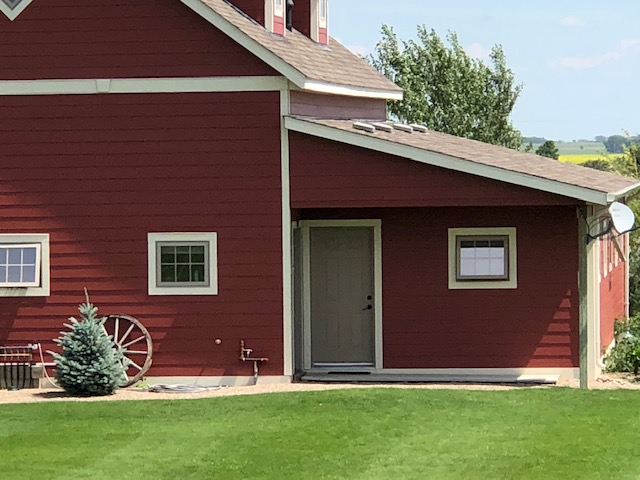 A Home Entrance With Red Walls